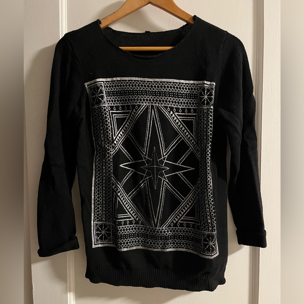 Sweater with silver detail. Fits like a Small